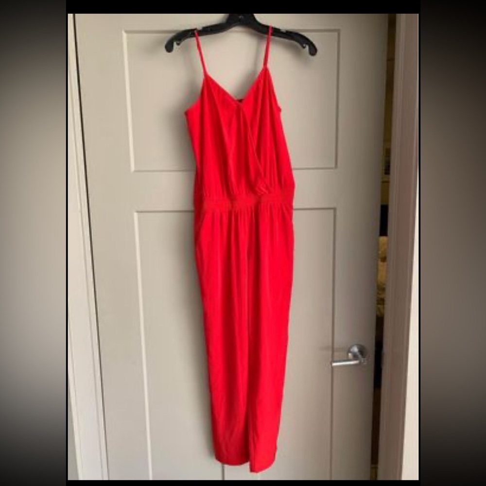 Women’s Express red jumpsuit- size 0 NWT
